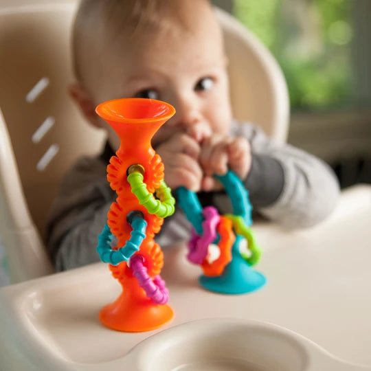 Mordedores sonajeros sensoriales Pipsquigz loops Naranjo