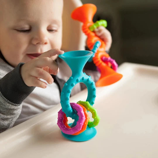 Mordedores sonajeros sensoriales Pipsquigz loops celeste