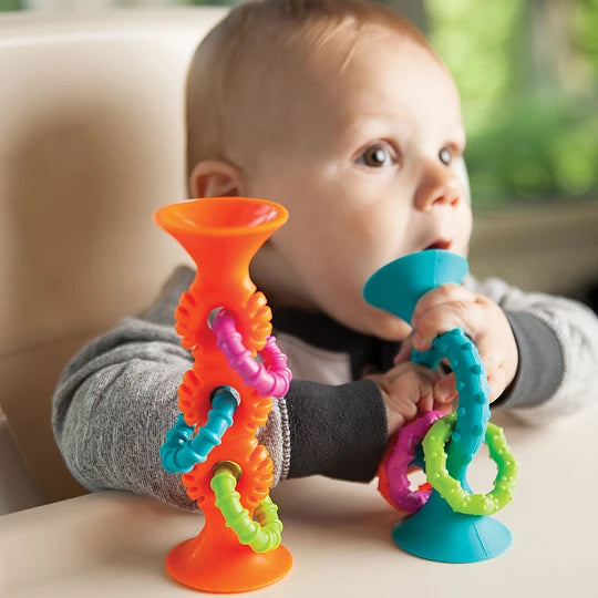 Mordedores sonajeros sensoriales Pipsquigz loops celeste