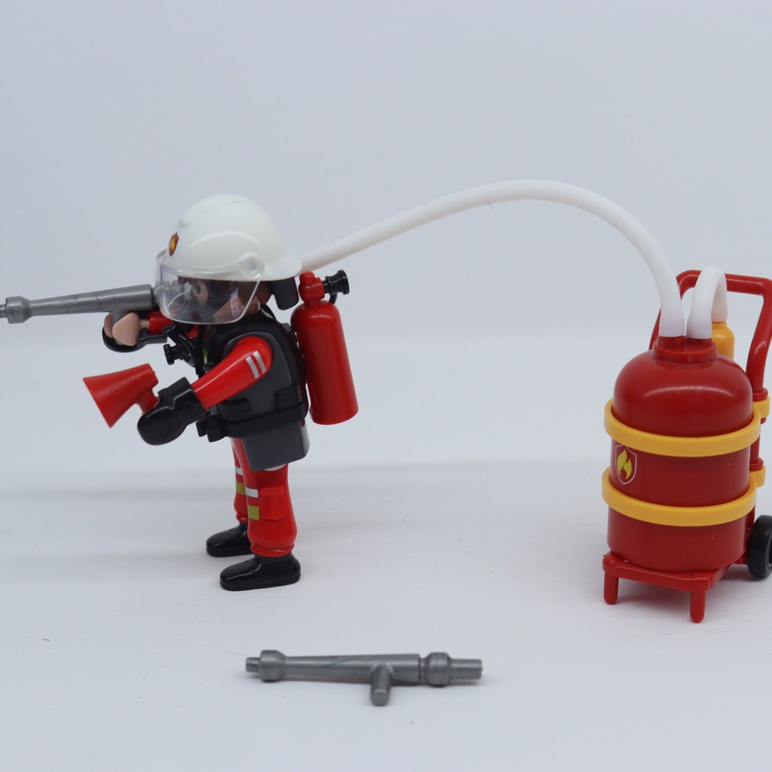 Figura Bombero con Carro Extintor de Incendios