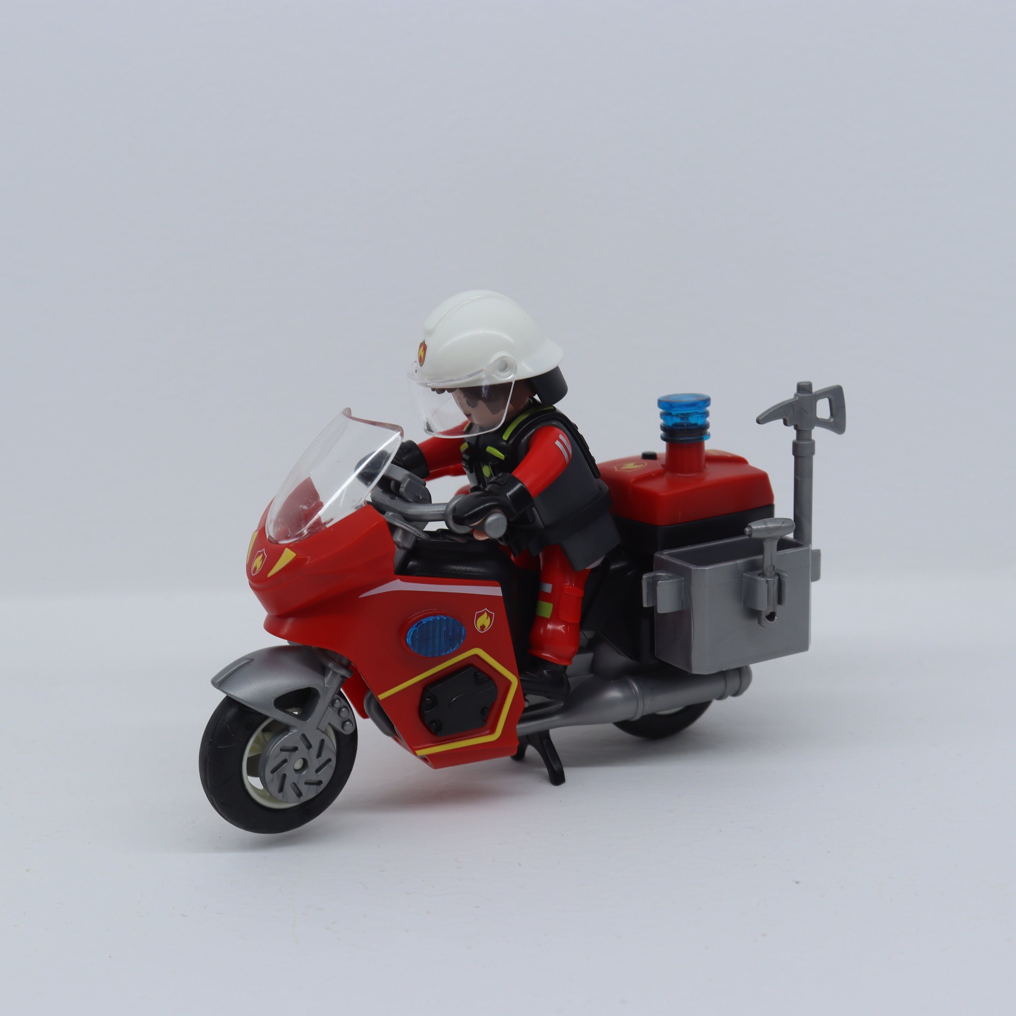 Set Motocicleta + Figura Coleccionable Bomberos
